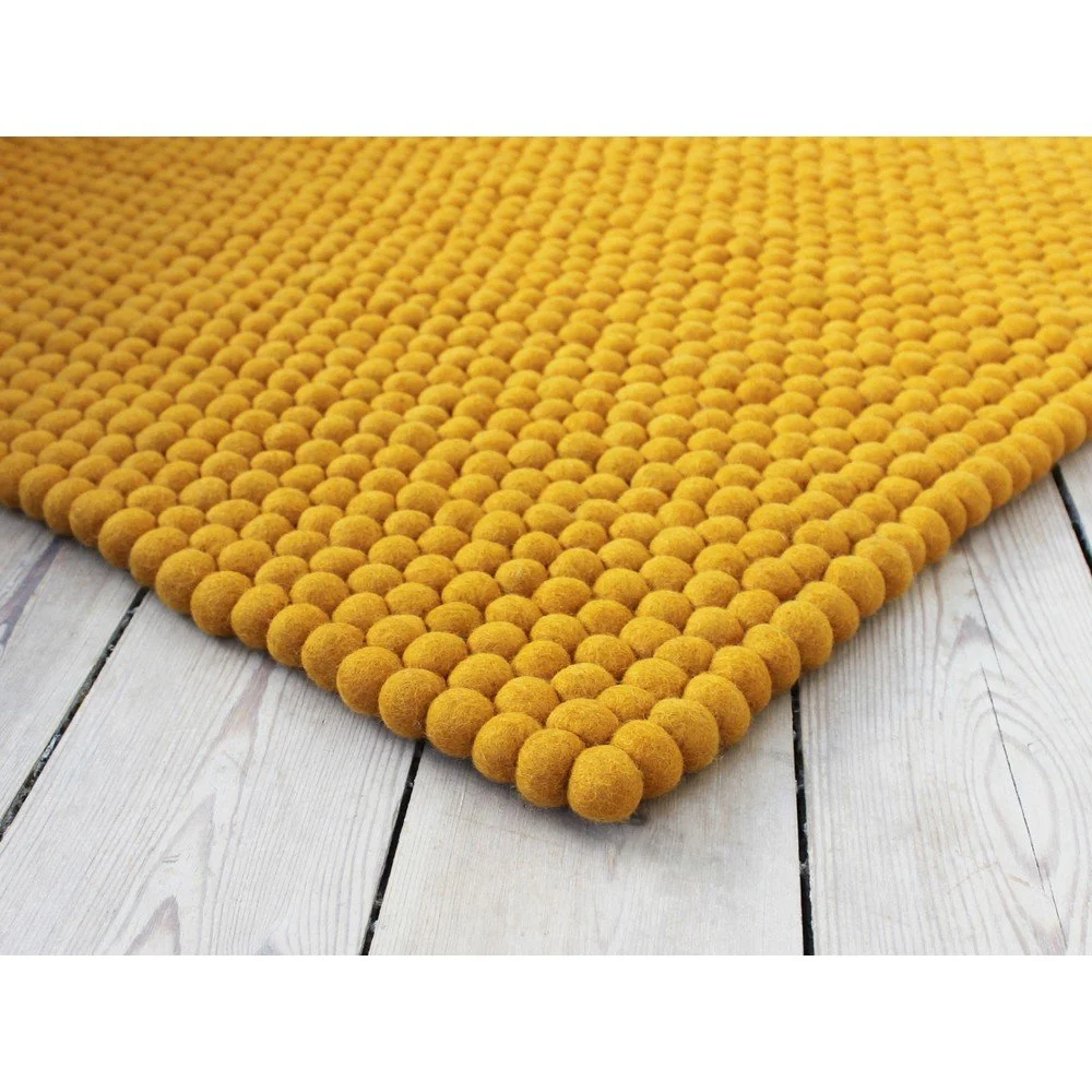 Hořčicově žlutý kuličkový vlněný koberec Wooldot Ball Rugs, 100 x 150 cm v:1340941